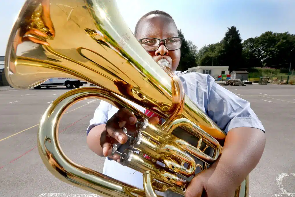 Picture : Lorne Campbell / Guzelian
Albright Kodom Abrafi,  11, a pupil at the Academy at St James School in Bradford , West Yorkshire, signals the end of term and the start of school holidays, by  playing slow melodies on his euphonium, during his last day of school before moving to secondary school.
PICTURE TAKEN ON WEDNESDAY 21 JULY 2021